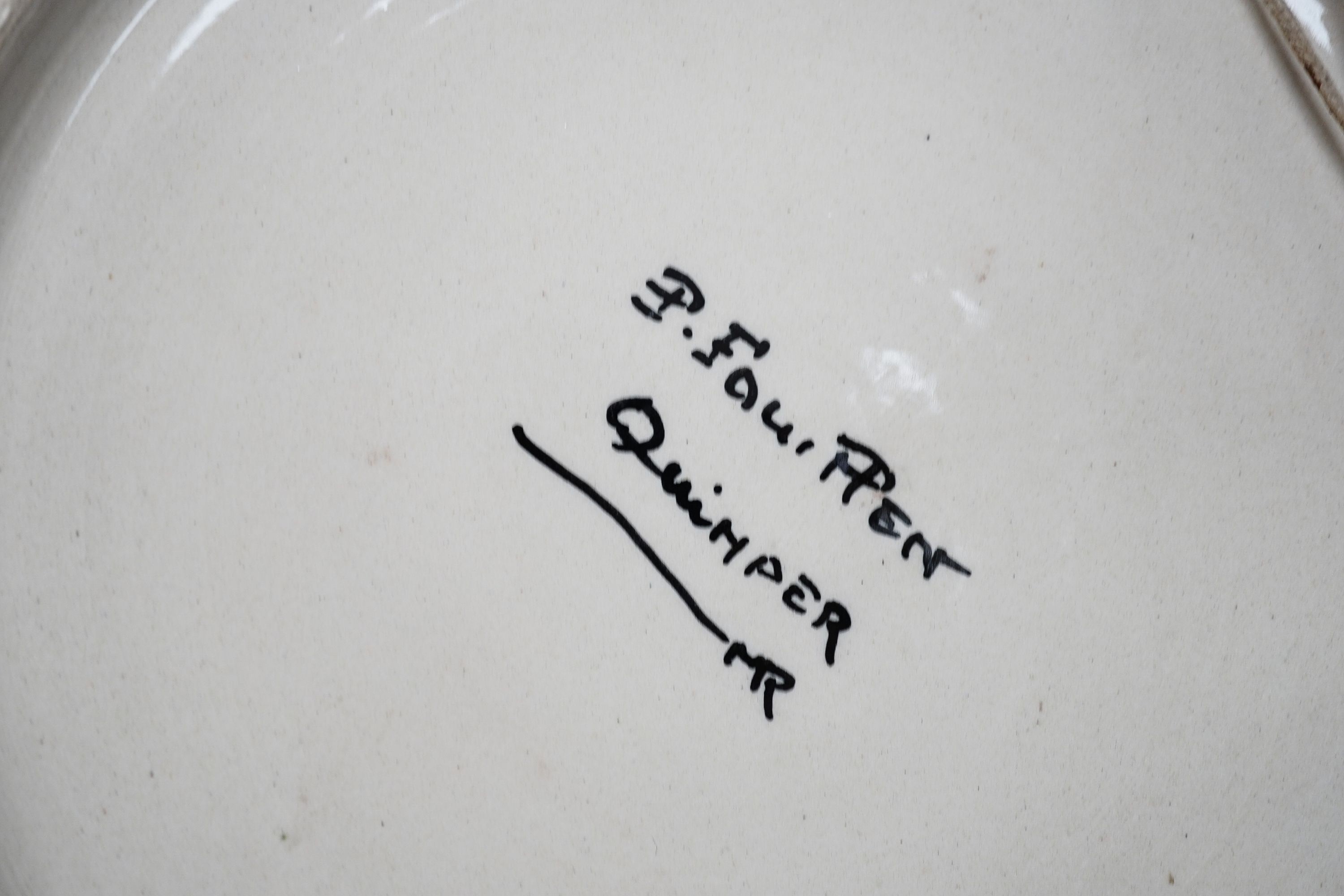 A Quimper dish, 28.5 cm and a dish by Paul Fouillen, and a Quimper dish by Maurice Fouillen